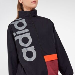 Adidas Women's Black Windbreaker with Red and Orange Accents